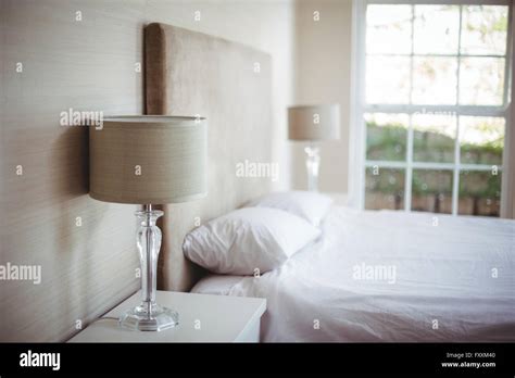 Lamp shades in bedroom Stock Photo - Alamy