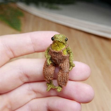 Tiny Knitted Frog In Brown Overall By Julia Laparina Tedsby