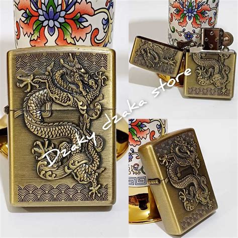 Jual Lighter Atau Korek Api Warna Gold Motif Timbul Sudah Terdapat