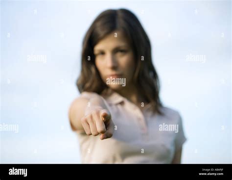 Woman pointing at camera Stock Photo - Alamy