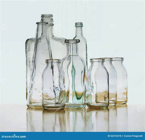 Glass Bottle Refraction Reflection Floating On Horizon Stock Photo