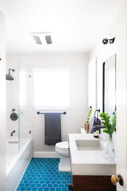 White Bathroom With Bright Blue Hexagon Floor Tiles Transitional