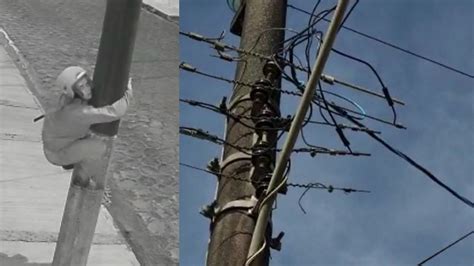 Vídeo mostra homem escalando poste para furtar fios de energia no