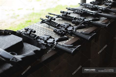 Various machine guns arranged in military training — weaponry, boot ...