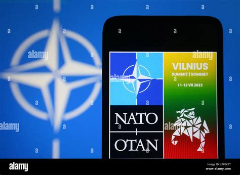 In this photo illustration, NATO Summit Vilnius 2023 logo is seen on a ...