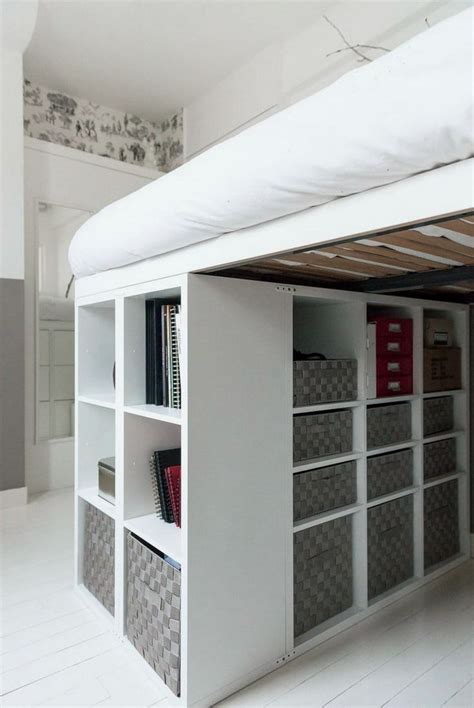 A Loft Bed With Shelves Underneath It And Bookshelves On The Bottom