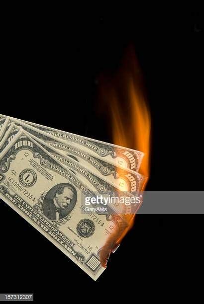 Money To Burn Stock Pictures Royalty Free Photos Images Getty