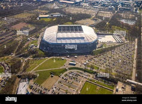 Aerial view, Veltins-Arena Bundesliga stadium of FC Schalke 04 with open roof and filled parking ...