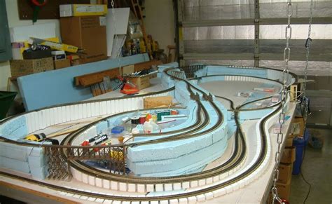 Model train track layouts for 4x8 bench