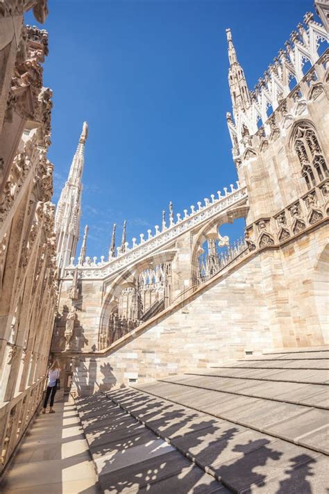 View Of Gothic Architecture And Art On The Roof Of Milan Cathedral