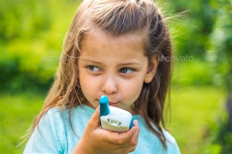 Small girl,kid play in walkie-talkie.Walkie Talkies with channels.Game ... 