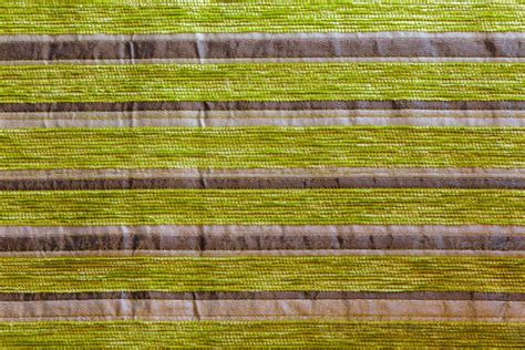 green striped synthetic woven upholstery fabric close-up texture ...