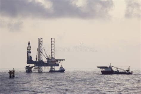 Oil Rigs And Supply Boat Stock Image Image Of Pollution 248606765