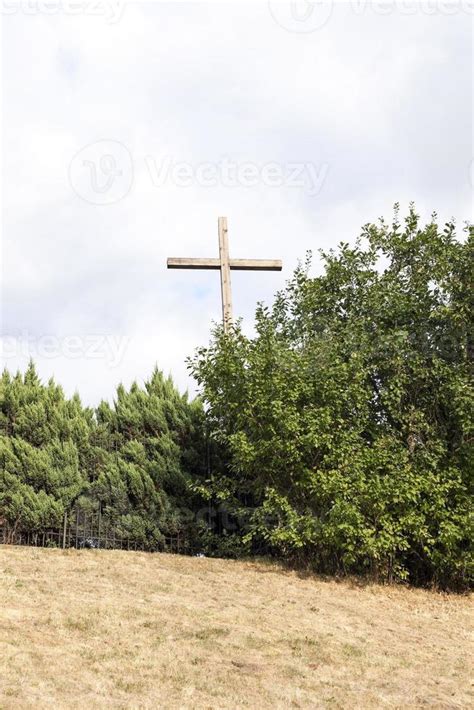 wooden cross near the church 9451324 Stock Photo at Vecteezy