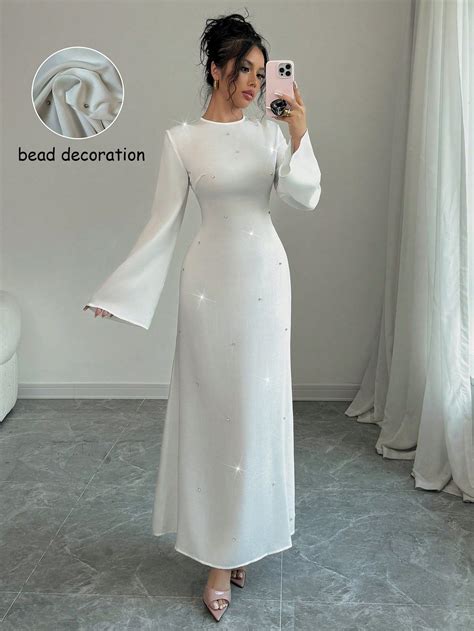 Form-Fitting Elegant Hand-Beaded Flare Sleeve Cinched Waist Dress in