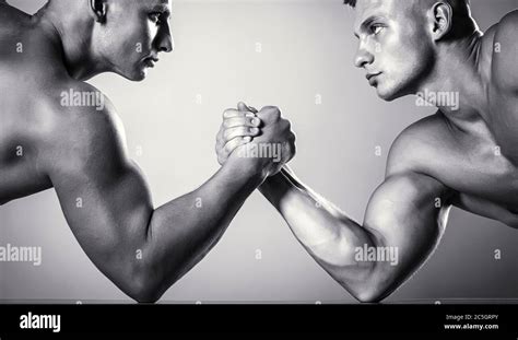 Hand wrestling, compete. Hands or arms of man. Muscular hand. Clasped ...