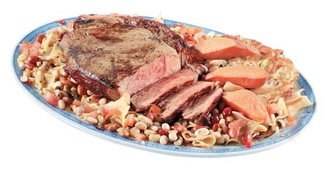 Beef London Broil Sliced Over Vegetables And Pasta Prepared Food Photos Inc