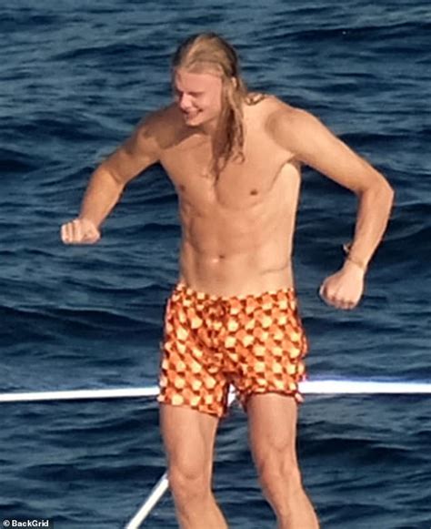 Manchester City Star Erling Haaland Strips Off His Shirt As He Unwinds