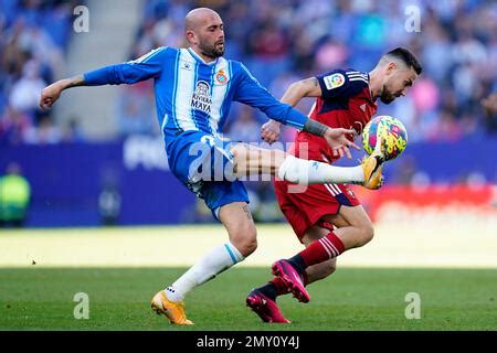 Aleix Vidal Of RCD Espanyol And Moi Gomez Of CA Osasuna During The La