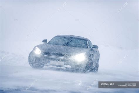 Luxury car in snowy road — background, business - Stock Photo | #230919338