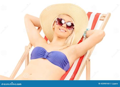 Woman In Bikini Relaxing On A Sun Lounger Stock Photo Image Of