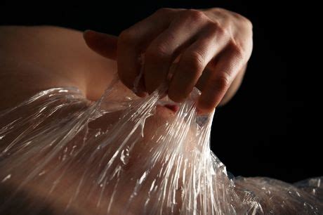 Blonde Teen Yasmina B Removes Plastic Wrap Before Masturbating In The Nude