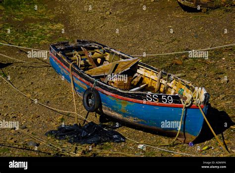 Old Derelict Wooden Fishing Boat At Low Tide Stock Photo Alamy