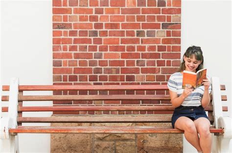 Free Photo Reading Girl Sitting On Library Floor