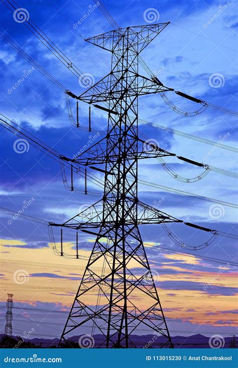 High Voltage Electricity Pylon Against Blue Sky Stock Photo Image Of