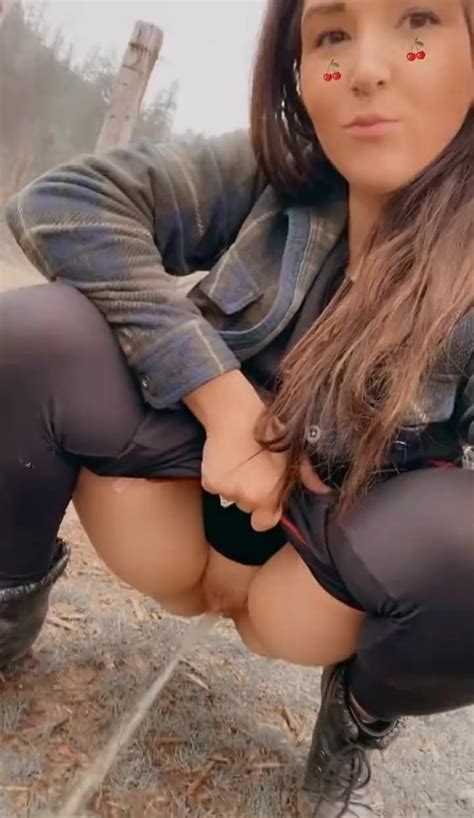 Cute Babe Films Herself Peeing Outside ThisVid