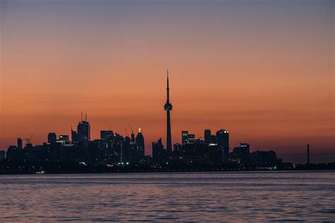 Silhouette of CN Tower in Toronto During Sunset · Free Stock Photo