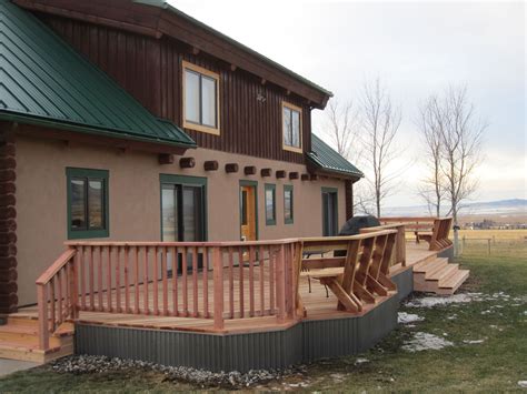 Redwood Deck With Corrugated Steel Skirt And Built In Benches Built