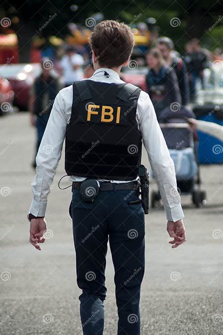 Portrait Of Man With Fbi Uniform And Bullet Proof Editorial Photo