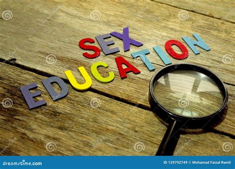 Word Sex Education Colorful Wooden Alphabet Letters Set And Magnifier On Wooden Background