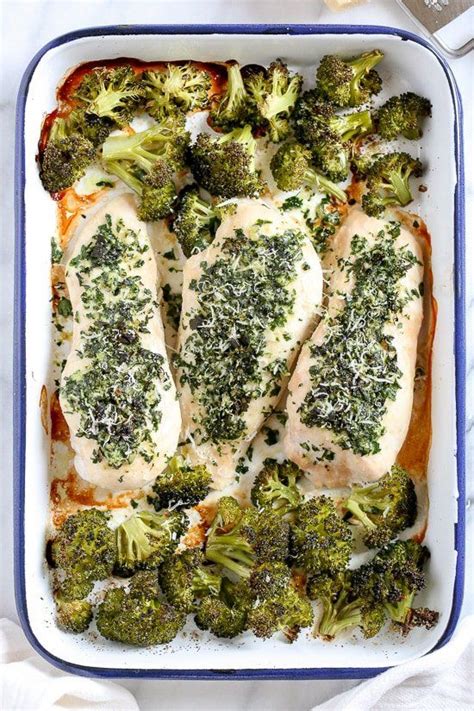 Broccoli Florets And Chicken In A Casserole Dish With Sauce