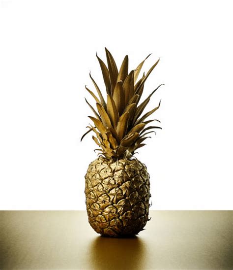 Golden Pineapple Stock Photos, Pictures & Royalty-Free Images - iStock