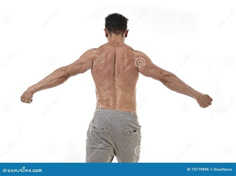 Hispanic Man With Naked Torso Posing On Smoked Dark Background Stock Image CartoonDealer