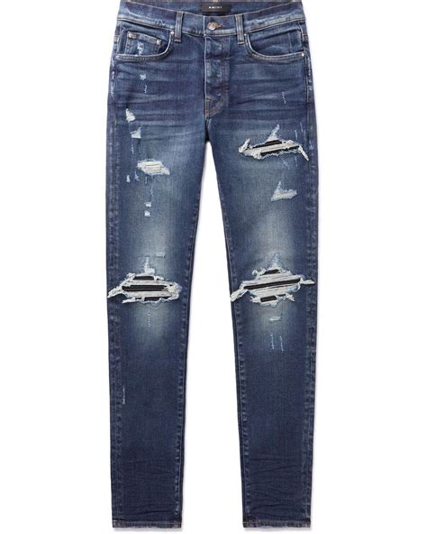 Amiri Mx Skinny Fit Leather Panelled Distressed Jeans In Blue For Men