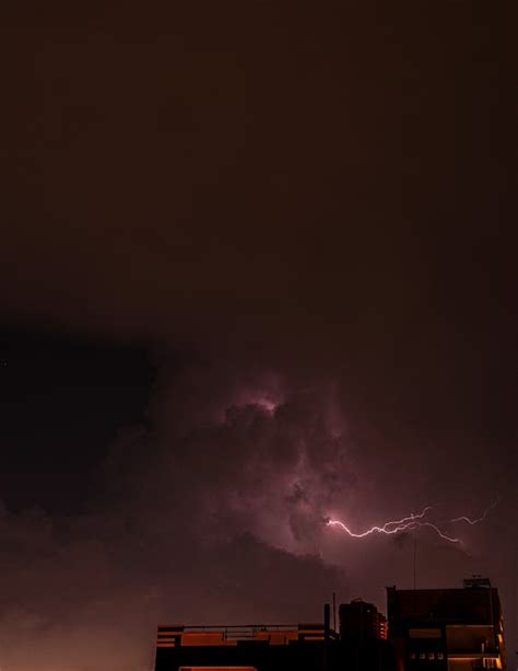 A Lightning on a Cloudy Sky · Free Stock Photo