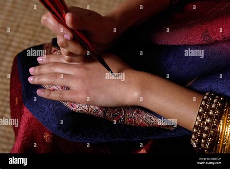 Indian Woman Painting Hand With Henna Stock Photo Alamy