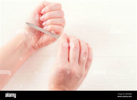 White Woman S Hand With Healthy Natural Nails Getting Nail Care