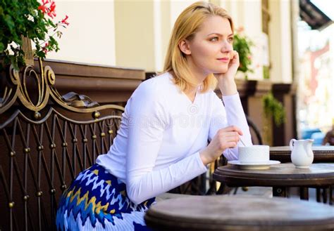 Pleasure On Her Mind Woman Blonde Dreamy Smiling Face Outdoors Building Background Defocused