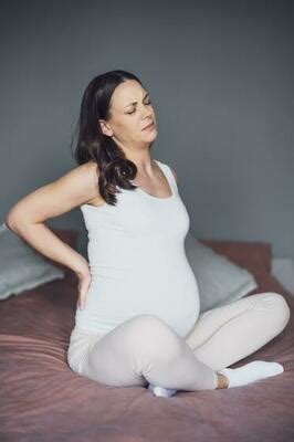 Pregnant Back Pain Stock Photos, Images and Backgrounds for Free Download