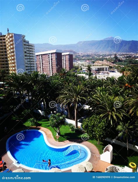 Tenerife View from a Hotel. Teide Volcano, Pool, Palm Trees and Summer Stock Image - Image of ...