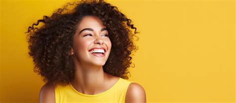 Premium AI Image Smiling Latina Woman With Curly Hair On A Blank