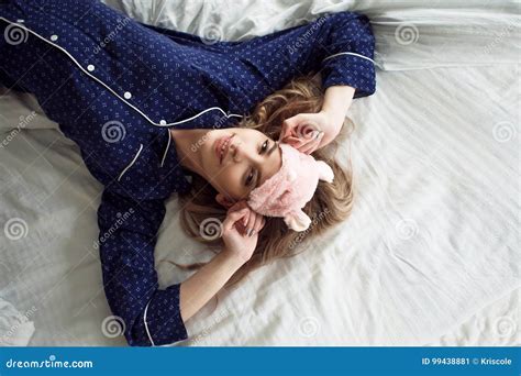 Cute Blonde In Her Bed In Blue Pajamas And Sleep Mask Top View Stock Image Image Of Nice
