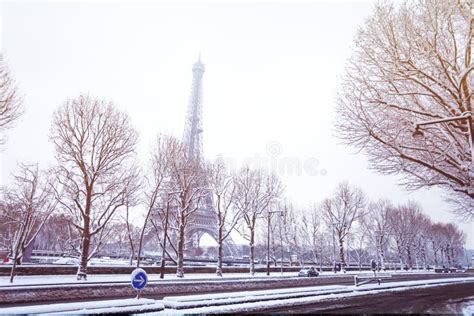 Snow-covered Streets of Paris and the Eiffel Tower Stock Image - Image ...