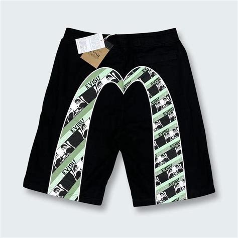 Evisu Men's Black and Green Shorts | Depop