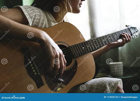 Girl Playing An Acoustic Guitar Stock Photo Image Of Femininity