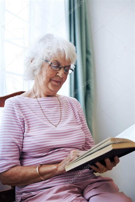 Old Lady Reading Her Novel Stock Photo By Daxiao Productions 74975293